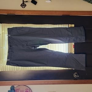 A pair of men's Chino straight leg pants in gray.